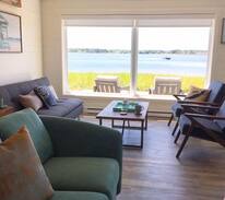 Jardineville Cabin | River Beachfront Cottage