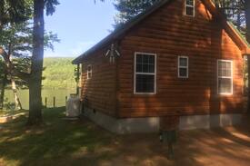 Bingham Cabin | Cozy Cabin Steps from Wyman Lake