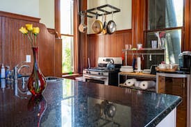 Galveston House | Grand Manor Luxury Suites- Vanilla Orchid Room