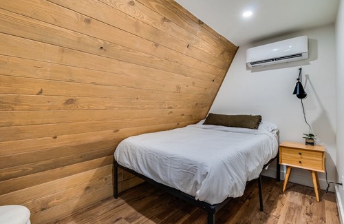 New Iberia Cabin | Modern A-Frame Cabin by Rip Van Winkle Gardens w/ Hot Tub & Fireplace!
