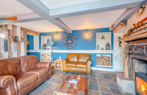 Dunure Cottage | The Harbour Nook is a gorgeous ground floor, coastal apartment situated at the harbour’s edge with l