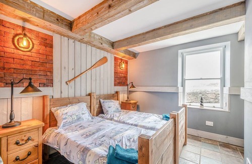 Dunure Cottage | The Harbour Nook is a gorgeous ground floor, coastal apartment situated at the harbour’s edge with l