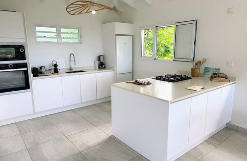 Grand-Bourg Villa | Grey houses, a beautiful villa featuring a piscine, cosy and spacious areas