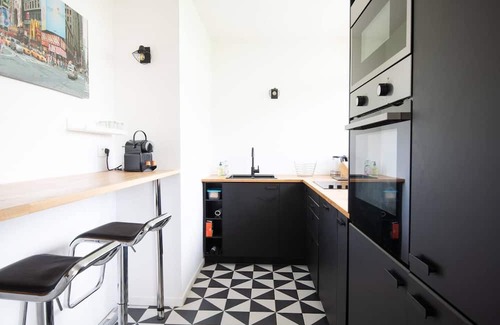 Croix Apartment | Standing apartment lift balcony garden view