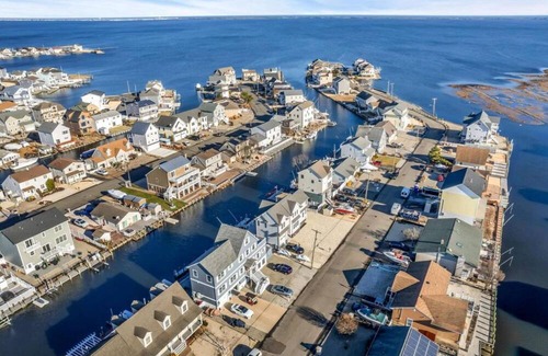 Bayville House | Exclusive Waterfront Rental with Complimentary three Jet Ski Ultimate Summer Fun