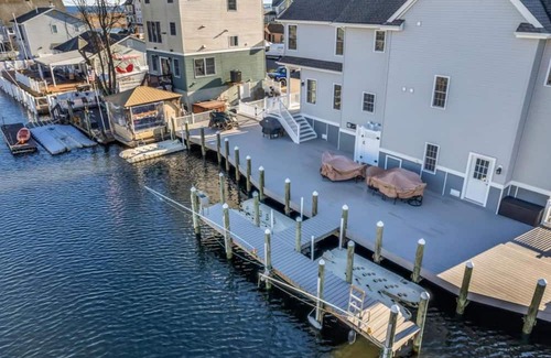 Bayville House | Exclusive Waterfront Rental with Complimentary three Jet Ski Ultimate Summer Fun
