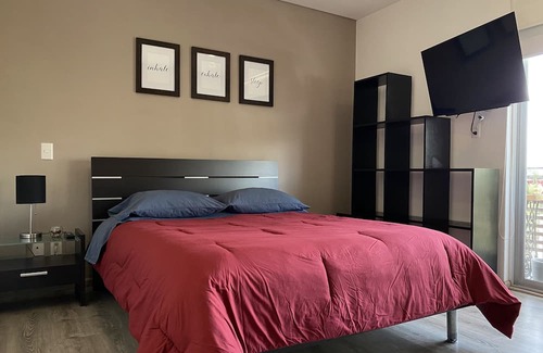Carmen Apartment | Habitación con Baño Privado y Estacionamiento