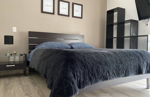 Carmen Apartment | Habitación con Baño Privado y Estacionamiento