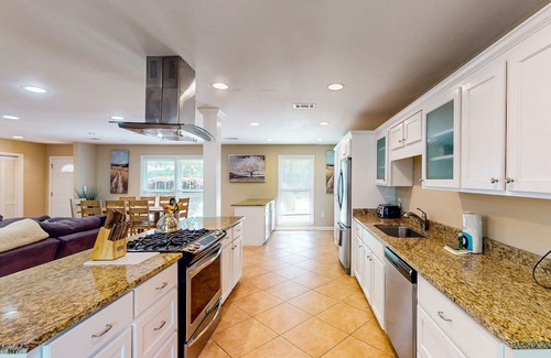 Isle of Hope Historic District House | Updated dog-friendly home with screened porch, children's items, & pellet grill