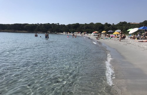 Cala Liberotto Apartment | Cozy apartment, 150 from the beach. Family-friendly, with garden and parking.