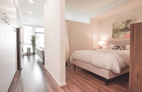 Mercer Island Apartment | Chic Mercer island Urban Bedrooms w/ Gym & Roof deck
