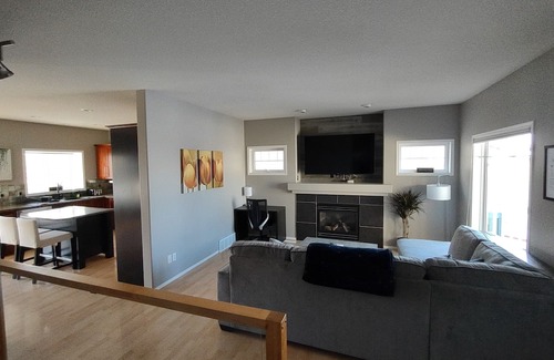 Grande Prairie House | Peaceful Home Away From Home- Clean, Fully-Stocked & Pet Friendly