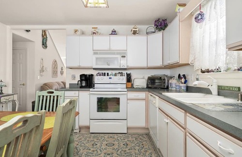 North Ocean City House | 13463 Madison Ave 4 br 2.5 bath house off Rt 54/Madison Ave with boat dock and yard