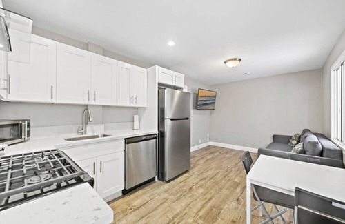 Balboa Island Condo | 8 Beach front Building* Walk to restaurants shops!
