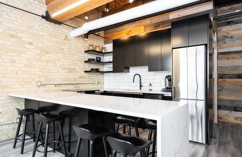 Exchange District Condo | Dette ejerlejlighed er 2 soveværelser, 1 badeværelser, der ligger i Winnipeg, Manitoba.