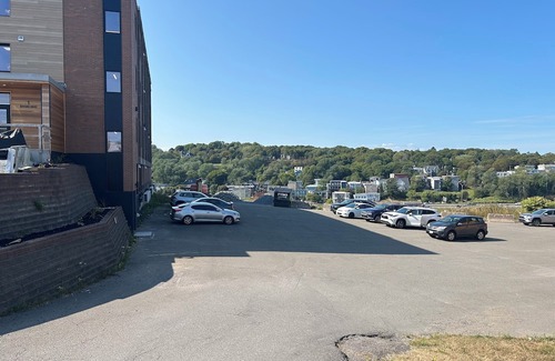 Saint John Apartment | Modern 1–BR Apartment near St. Joseph’s Hospital, Walk to Uptown, AC & Parking