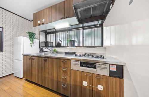 Shinjuku House | Private house for rent 5 min walk from train station sleeping up to 8 people/4 bedrooms/7 beds/FreeWi-Fi