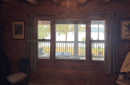 Livingston County Cabin | Log cabin w/walk out basement and loft located on Ohio Rivers edge.