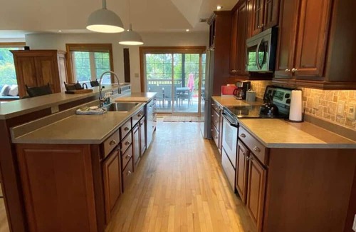 Wellington Apartment | Private Beach, Hot Tub, A Vacay to Remember!