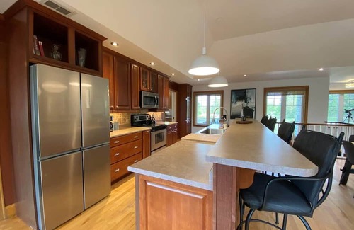 Wellington Apartment | Private Beach, Hot Tub, A Vacay to Remember!