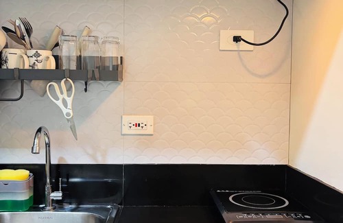 Iloilo Condo | Convenient City Hub with Relaxing Interior