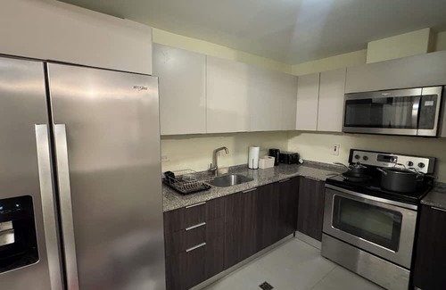 Arouca Condo | Vive Luxe Condo , Pool & 24/7 Security near Airport