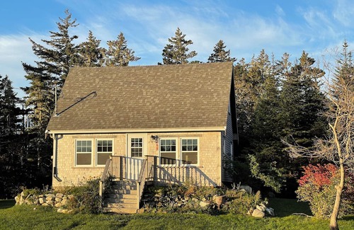 Indian Harbour Cottage | Charming historic oceanfront 2-bedroom cottage in beautiful Indian Harbour.