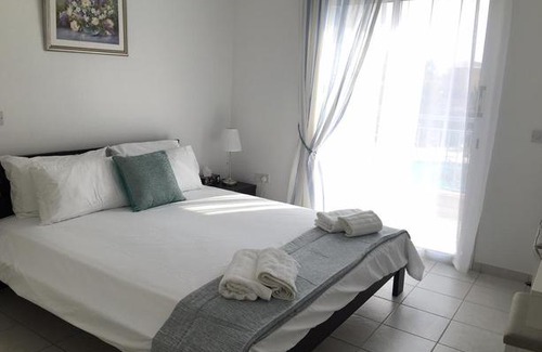 Paphos Apartment | Modern pool facing apartment in popular Limnaria Gardens