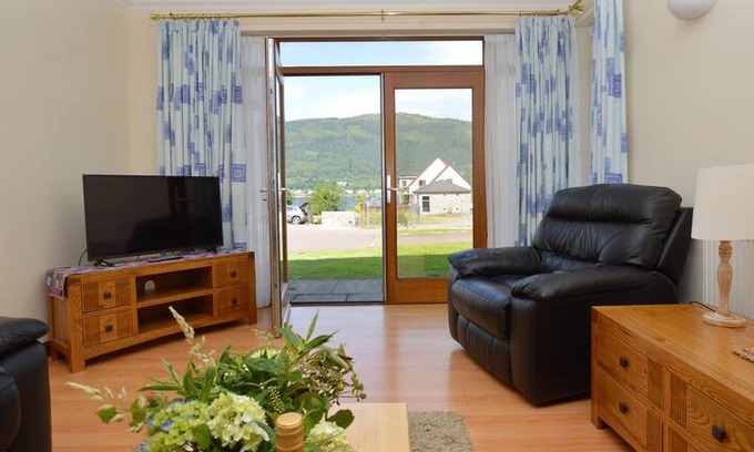 Kilmun House | Ferrymans Holiday Apartment, loch views, pet friendly