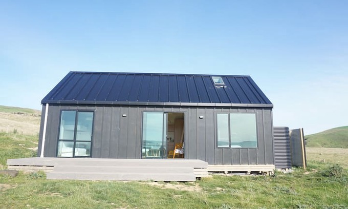 Curio Bay House | The Little Black Barn overlooking Curio Bay