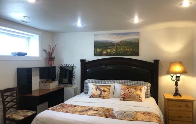 Hidden Valley House | basement suit master bedroom H