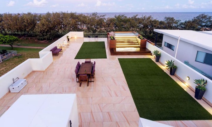 Mackay Harbour House | Beachfront Accommodation with Rooftop Entertaining