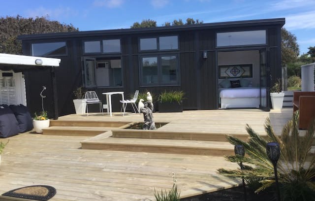 Peka Peka House | Aroha at Peka Peka, a private, sunny tiny house.