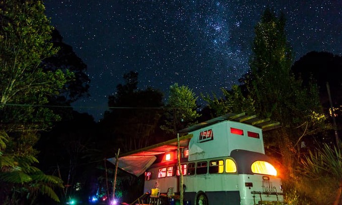 Tapu RV Rental | River Gypsy House Bus glamping