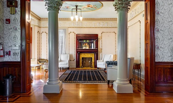 Galveston House | Grand Manor Luxury Suites- Vanilla Orchid Room