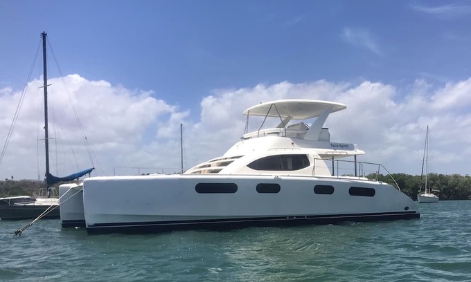 Florida North Atlantic Coast Boat Rental | Twin Spirit 48’ Power Catamaran surrounded by water!