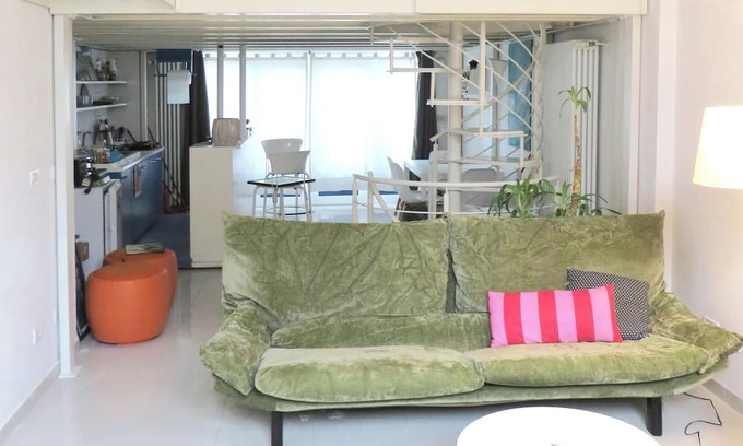 Barriera di Milano Apartment | Very bright open space apartment with entire glass wall