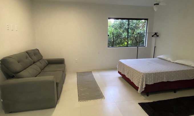 Garopaba Apartment | Apartment with kitchen in Praia da Ferrugem/SC surrounded by nature