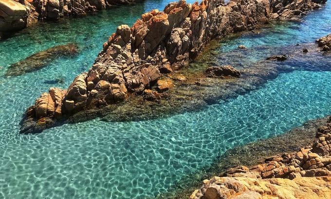 Cala Liberotto Apartment | Cozy apartment, 150 from the beach. Family-friendly, with garden and parking.