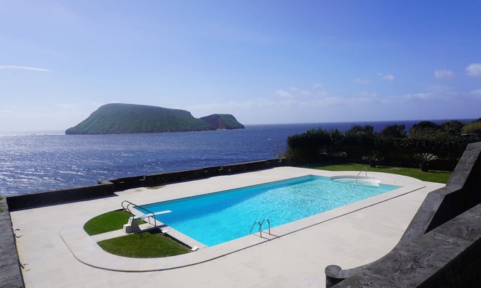 Porto Judeu House | Enormous pool and 180 degree ocean view home for 12
