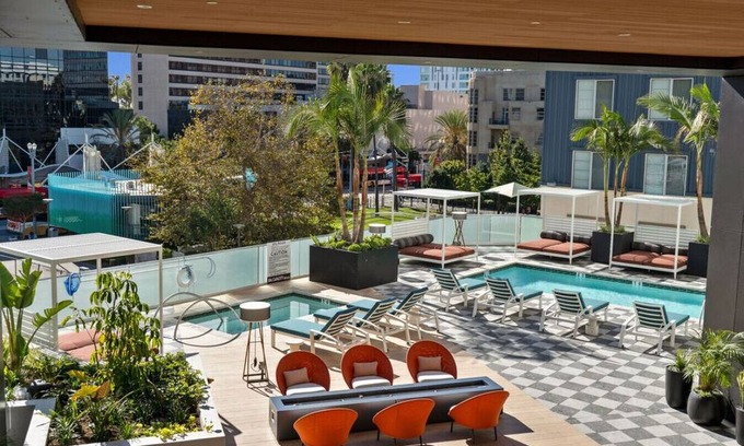 Waterfront Apartment | LUX walk Conv Ctr Free Park Wi-Fi EV Gym Pool D