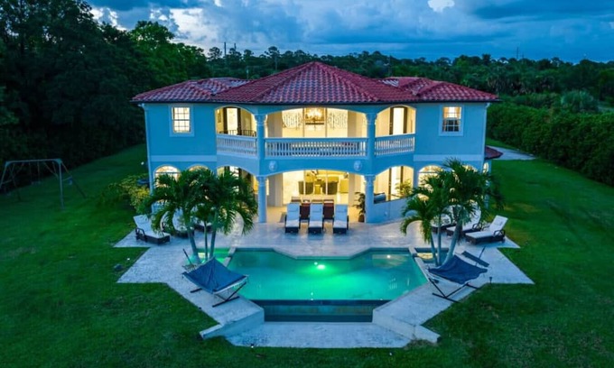 Palm City Apartment | Private 5000 SF Waterfront Mansion w/Pool & Games
