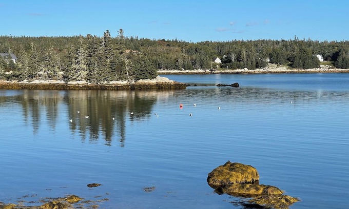 Indian Harbour Cottage | Charming historic oceanfront 2-bedroom cottage in beautiful Indian Harbour.