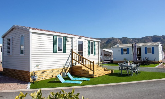 Benidorm Ski Chalet | Cozy 2-bedroom private chalet with all amenities close to charming Benidorm.